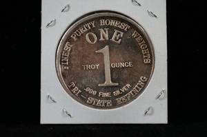 lot 12 image: Tri-State Dragon Troy Ounce Silver Round