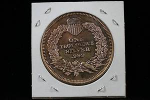 lot 13 image: One Troy Ounce Silver Round