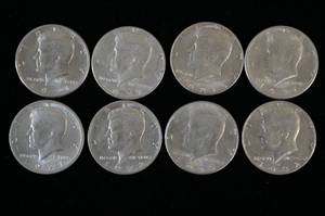 lot 61 image: 8 US Kennedy Half Dollar Coins