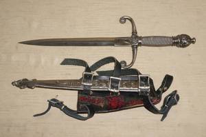 lot 78 image: Dagger with Scabbard and Wrist Strap