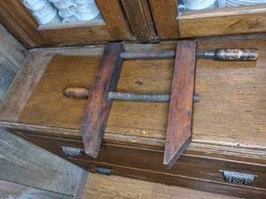 lot 31 image: Antique Wood Bench Vise Clamp