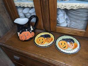 lot 38 image: Two Halloween Plates and Pitcher