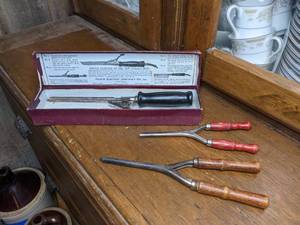 lot 53 image: (3) Antique Curling Irons