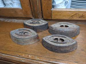 lot 58 image: (4) Antique Cast Iron Flat Irons