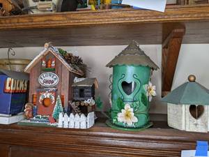lot 216 image: Lot of 3 Birdhouses and Tin Bird Feeder