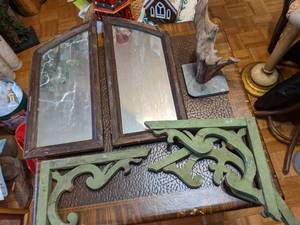 lot 249 image: Bifold doors with mirrors, carved wood corner supports, and wood sculpture