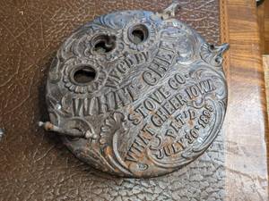 lot 257 image: What Cheer Stove Co Cast Iron Oven Door