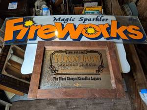 lot 139 image: (2) Plexiglass Fireworks Signs & (1) Yukon Jack Framed Mirrored Sign