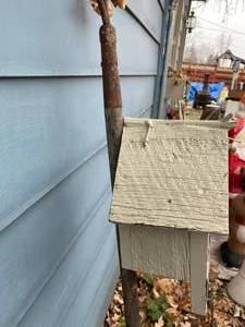 lot 383 image: Homemade Birdhouse on Garden Rake