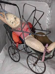 lot 306 image: Old Childrens Toy Buggy with Doll