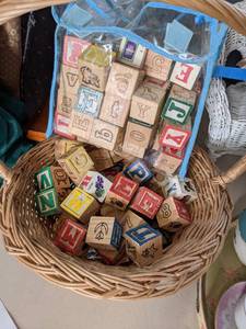 lot 324 image: Vintage Wood Blocks in Wicker Basket