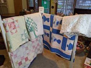 lot 646 image: Assorted Hand Stitched Quilts with Stand