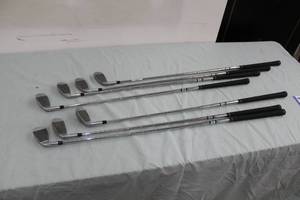 lot 27 image: Lot of (7) Ram G-Force Tour Step Golf Clubs - 4 Iron, 5 Iron, 6 Iron, 7 Iron, 8 Iron, 9 Iron, Pitching Wedge