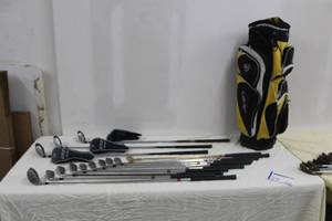 lot 29 image: Lot of (13) Golf Clubs - Ben Hogan H40 145678 Iron, Joe Powell 9 Iron, Hogan Putter, 8th Clements Golf Classic Putter, Adams Golf 1357 Woods, Walter Hagen Golf Club Bag, Golf Club Covers