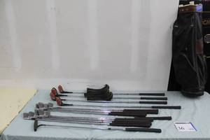 lot 36 image: Lot of (14) Wilson Golf Clubs - Staff 2 Iron, 3 Iron, 4 Iron, 5 Iron, 6 Iron, 7 Iron, 8 Iron, 9 Iron, Pitching Wedge, 4300 1 Wood, 3 Wood, 4 Wood, 5 Wood, Slotline Putter, Golf Club Bag, Golf Club Leather Covers