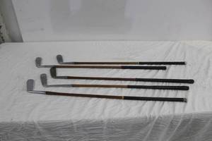 lot 77 image: Lot of (5) Vintage Wood Shafted Golf Clubs - Leader Putter, Scotch Par Putter, Thos. E. Wilson & Co. Autograph Putter, Windsor Putter, Wilson The Wilsonian