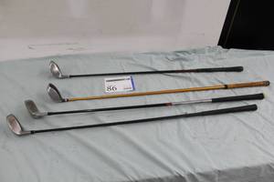 lot 86 image: Lot of (4) Golf Clubs - Rescue Mid 4 Iron, Adam Golf a3 Idea Hybrid 3 Iron, Cleveland Launcher 3 Iron, Nike Driver