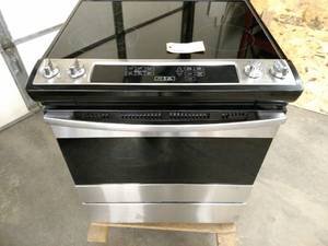 lot 55 image: Ikea Model IES790GSO Electric Range...