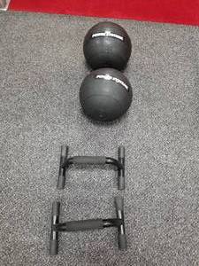 lot 34 image: Lot of Push-Up Bars - Paralettes (x2) and Power Systems Balls (x2 sizes 1-10lbs., 1-20lbs.)