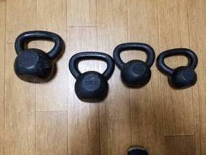 lot 111 image: Lot of (4) Cast Iron Kettlebells 10lb.15lb.20lb.25lb.