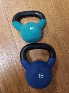 lot 113 image: Lot of (2) Pro Form Cast Iron Kettlebells 10lb.15lb.