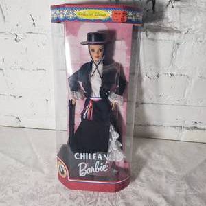 lot 228 image: Mattel BARBIE  Chilean and Polish Barbie Dolls NRFB