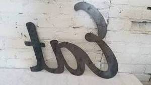 lot 149 image: Metal Wall Art  EAT