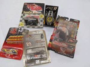 lot 260 image: NIB Racing Items Action Figure, Model Cars and Watch