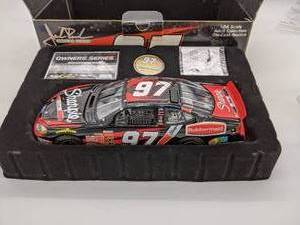 lot 42 image: 2002 Team Caliber Owners Series 124 Scale Diecast Replica Car - Kurt Busch #97