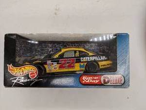 lot 15 image: NASCAR HOT WHEELS RACE DAY DELUXE CATERPILLAR PONTIAC  #22 NIB