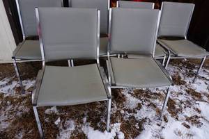 6 Grey Stackable Chairs