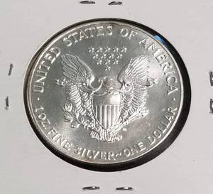 1988 AMERICAN SILVER EAGLE 1 TROY OZ. .999 FINE SILVER DOLLAR