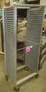 lot 13 image: Aluminum shelving rack on casters - Bread,  baking or storage.