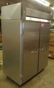 lot 14 image: McCall commercial refrigerator. double doors, casters, Stainless NICE