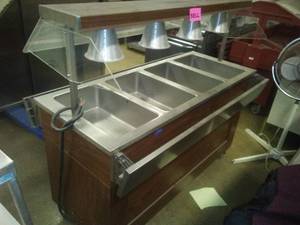 lot 20 image: Food Server, double sided, electric heat lamps.