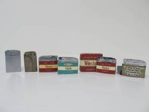 lot 55 image: Group of Vintage Advertising Cigarette Lighters