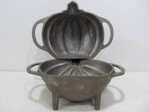 lot 46 image: 2 Vintage Cast Aluminum Pumpkin Cake Molds