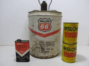 lot 134 image: Lot of 4 Vintage Oil Cans - Snap-On Tools Phillips 66 & Rislone