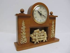 lot 154 image: Working Vintage UNITED Fireplace Clock