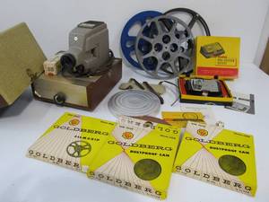 lot 279 image: Vintage Film Projector wMany Accessories