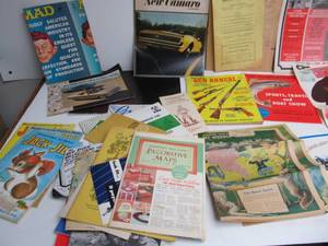 lot 343 image: Estate Lot of Vintage Paper Items - Comics Posters Car Brochures etc