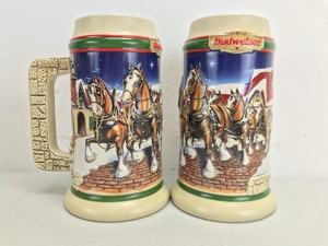 lot 10 image: Pair of 1998 Grants Farm Holiday Vintage Budweiser Holiday Steins (Lot of 2)