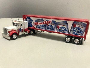 lot 29 image: Pabst Blue Ribbon Beer Collectable Miniature Semi-Truck (Missing Door)