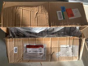 lot 94 image: 22-12 in. W x 14 in. D Black Sloping Wire Shelf with 3 in. Lip (Pack of 6)