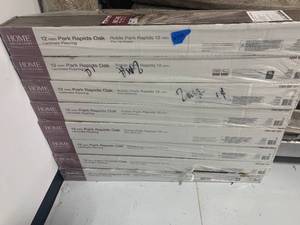 lot 132 image: Home Decorators Collection&nbsp12 mm Park rapids Oak Laminate Flooring, 8 casess