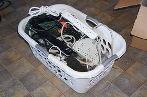lot 65 image: Basket of Power Strips and Cords