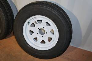 lot 457 image: Trailer Rim and Tire