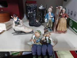 lot 55 image: Collectible Figurines Ice Skates, Boots, Hunters Stein & More