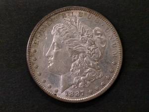 1887 S Morgan Silver Dollar...