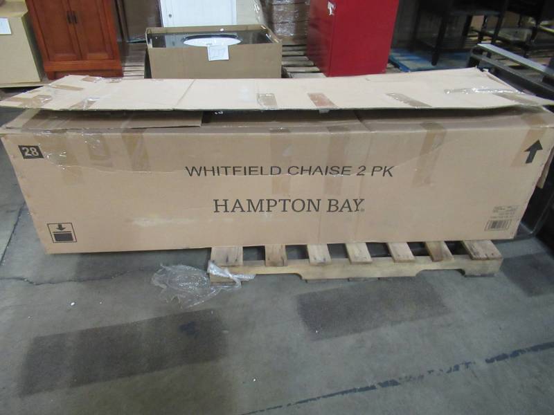 lot 115 image: Hampton Bay Whitfield Dark Brown Wicker Outdoor Patio Chaise Lounge with Standard Steel Blue Cushions 3022-CC3